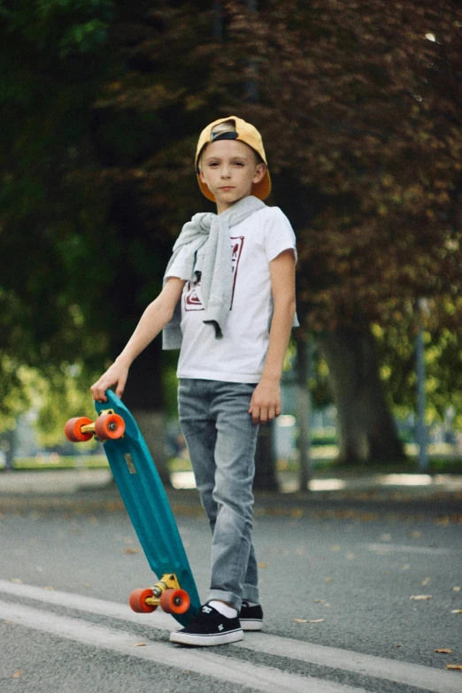 the  is riding his skateboard in the park