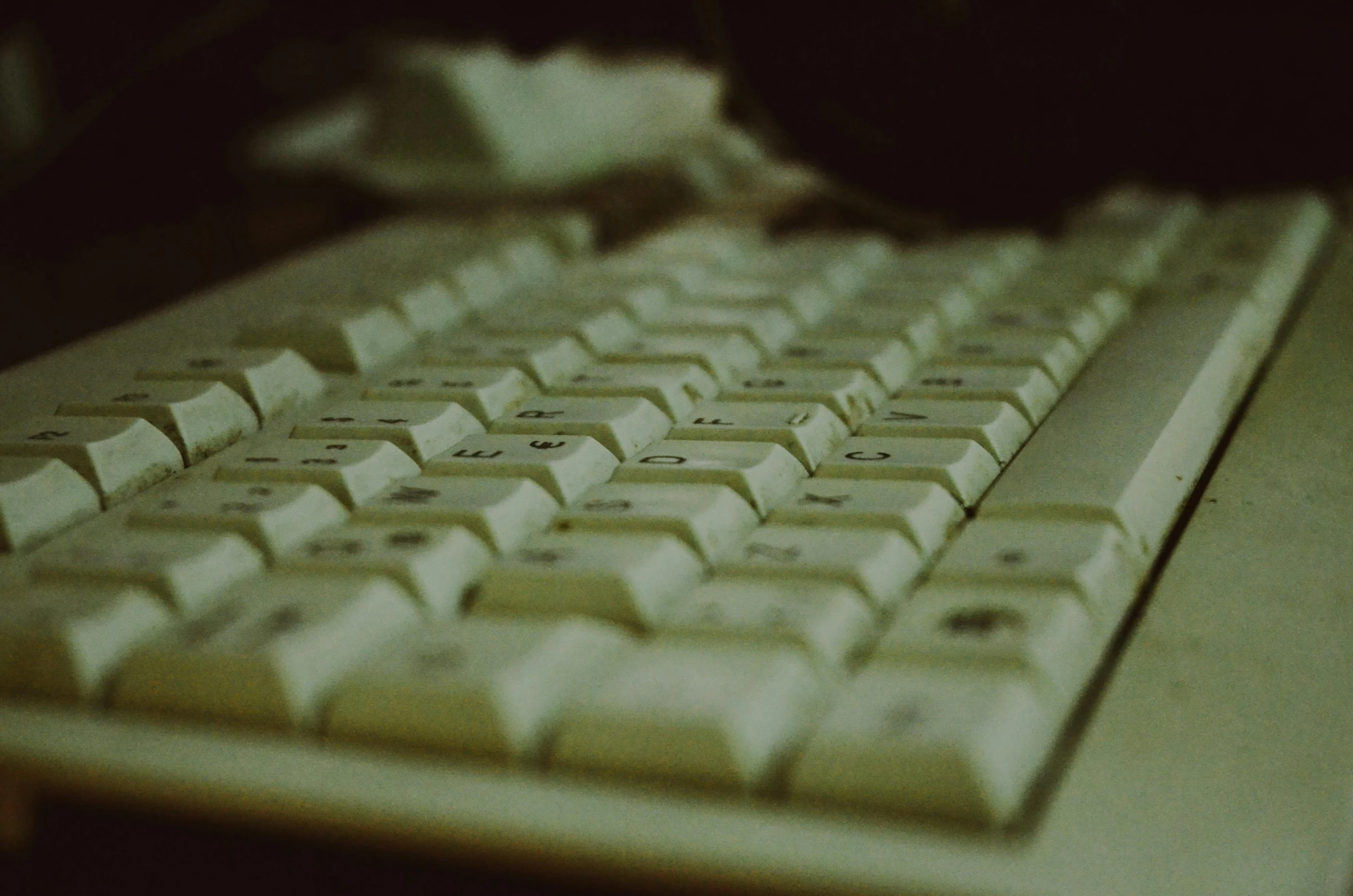 a close up view of a keyboard on a desk