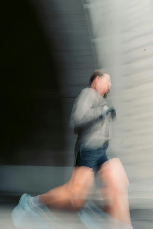 a blurry image of a person running