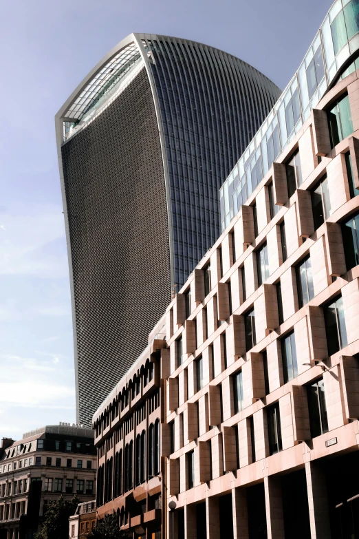 buildings with curved walls and a street sign