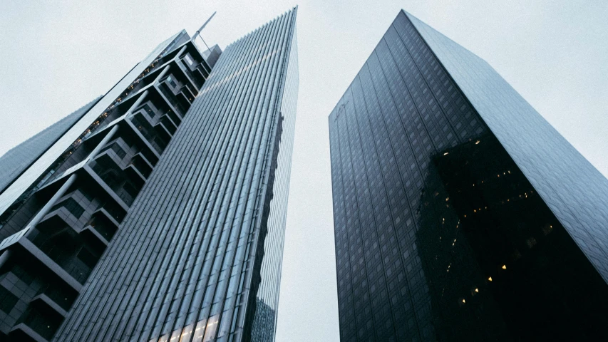 looking up at tall buildings in the city