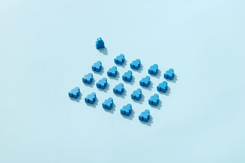 a small group of blue blocks arranged on the floor