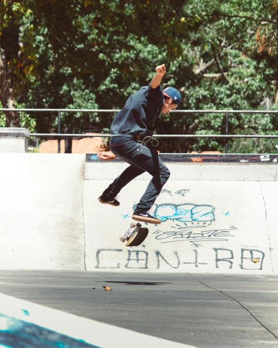 a man on a skateboard is doing tricks