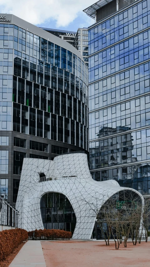 buildings and street signs in a city plaza