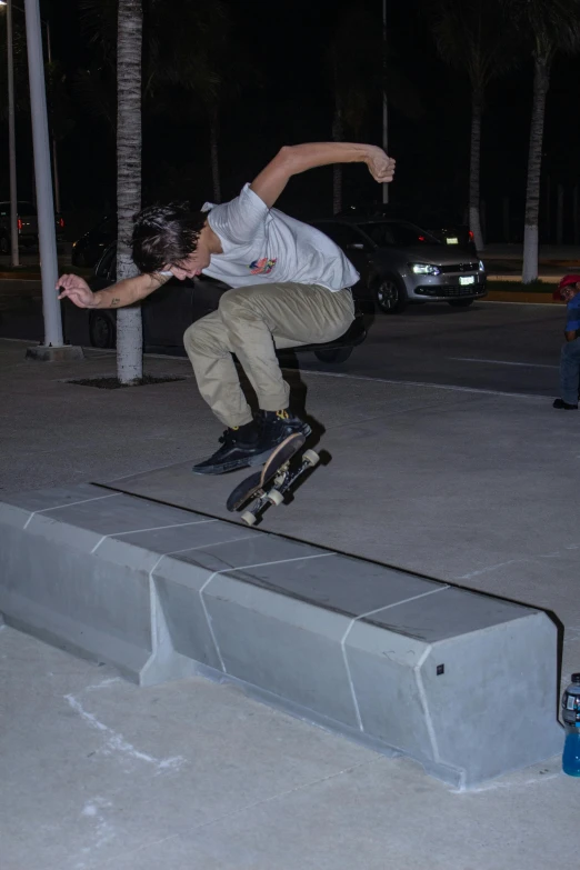 a skateboarder is doing tricks on a ledge