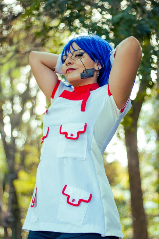 a woman in blue hair and white top with pink lining