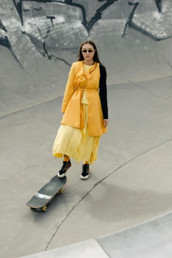 there is a woman standing with her feet on a skateboard