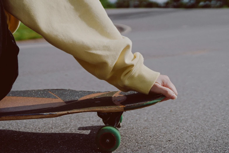 a person stepping on top of their skate board