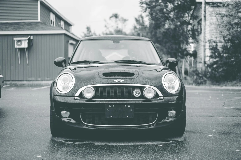 a black and white po of the front end of a car