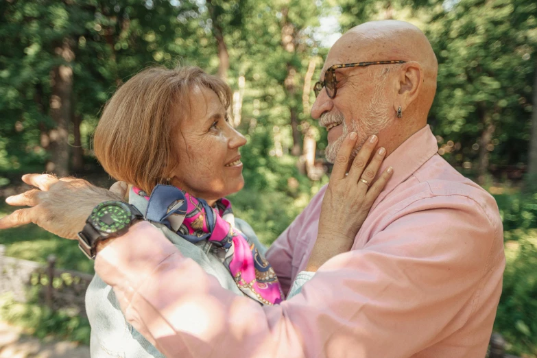 two people who are both wearing watches on their arms