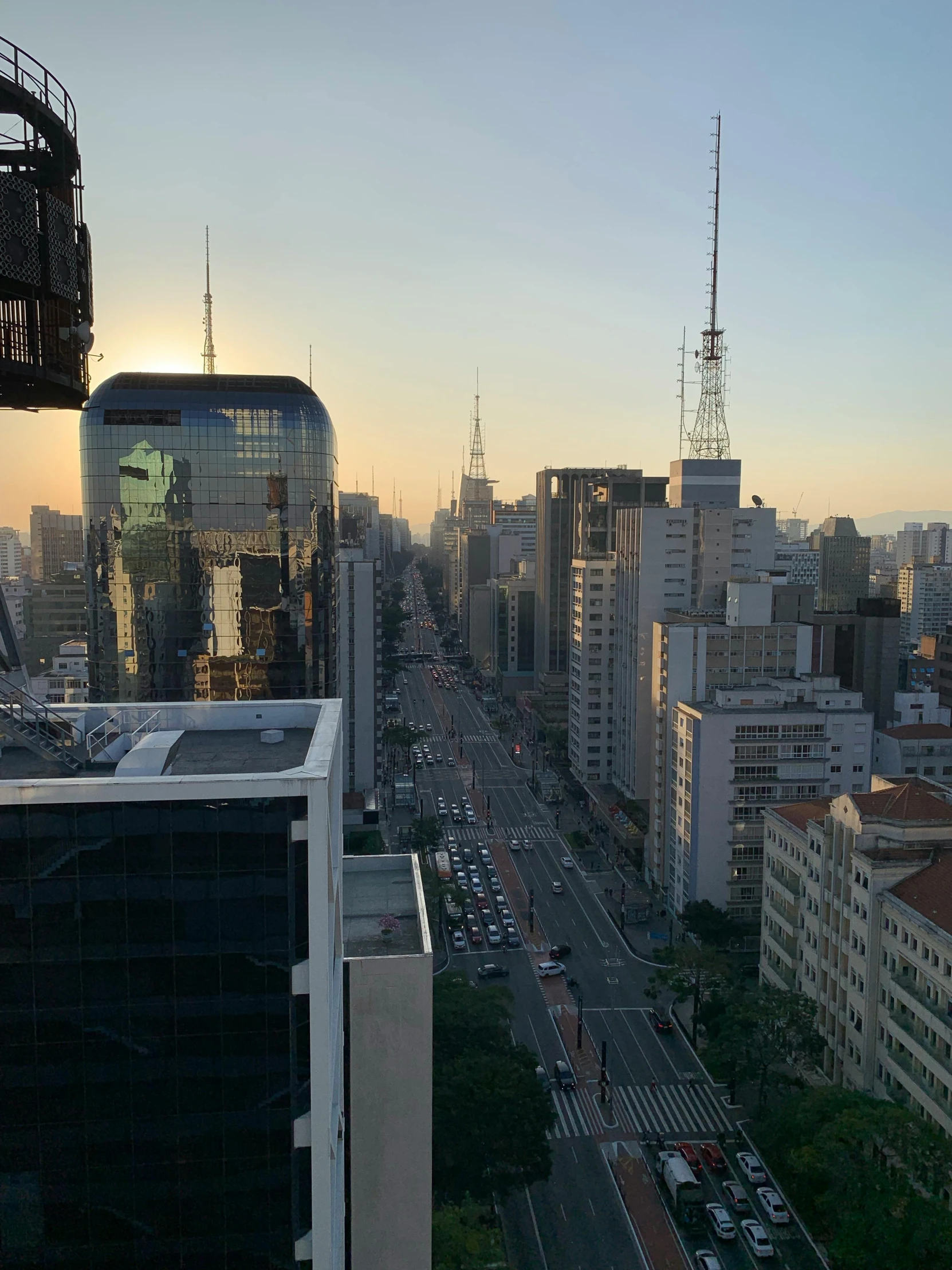 an aerial view of a city at sunrise