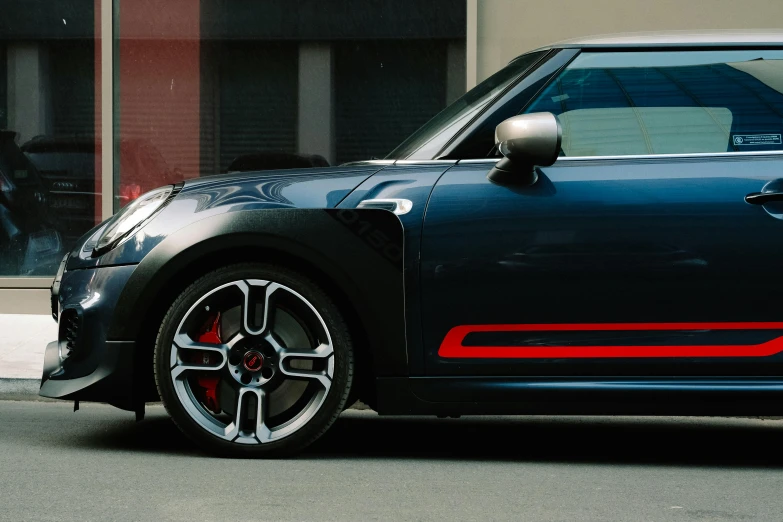 a close up of a car parked on the side of the road