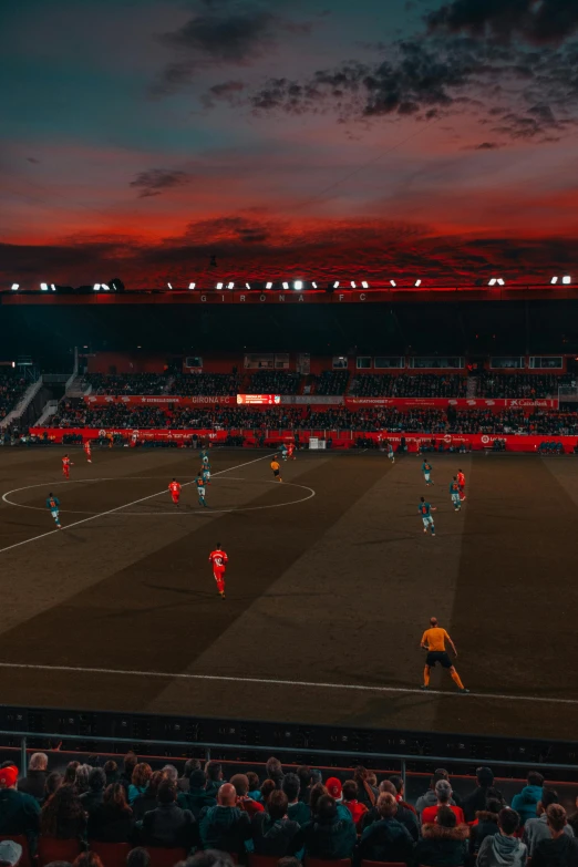 a group of men playing a game of soccer