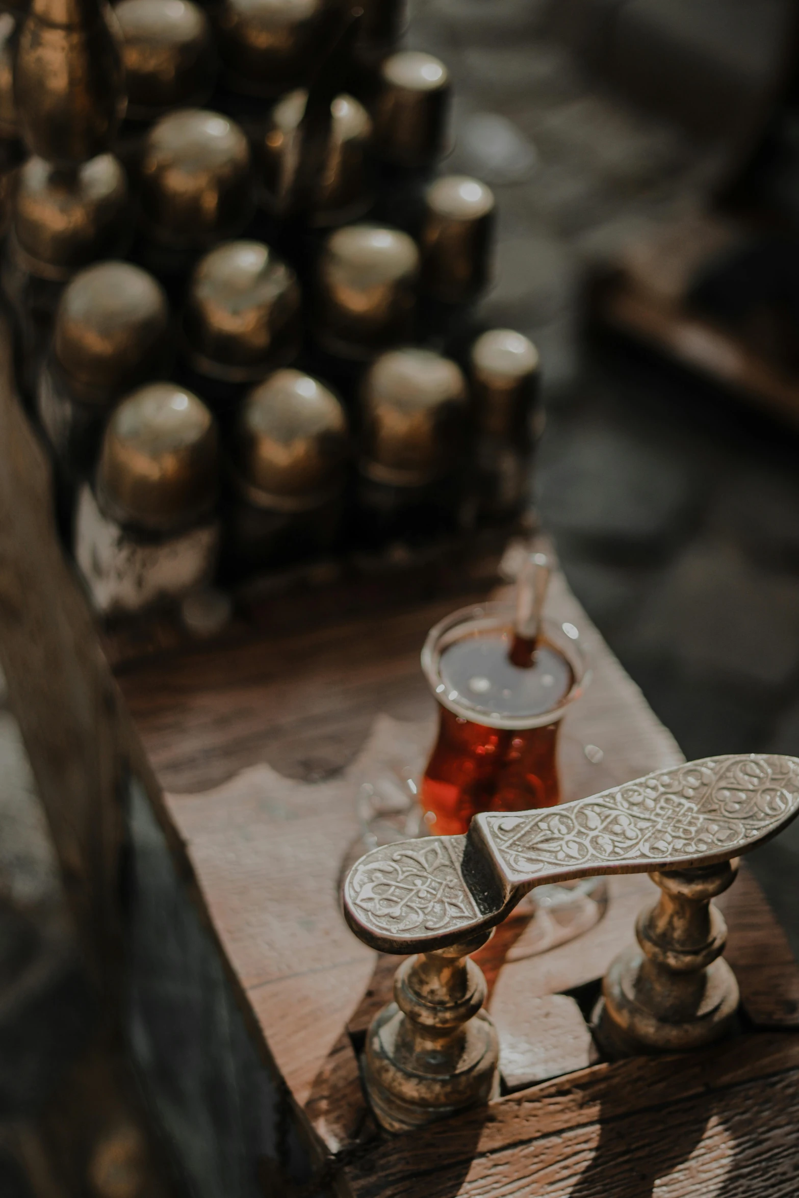 a miniature plane with a beer can next to it