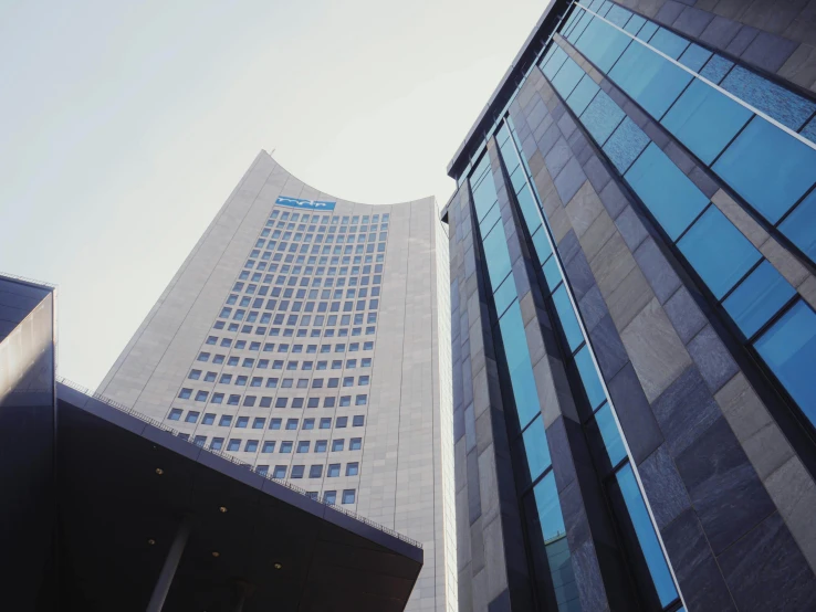 looking up at buildings near each other