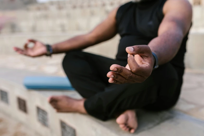 a man is doing yoga exercises in the sun