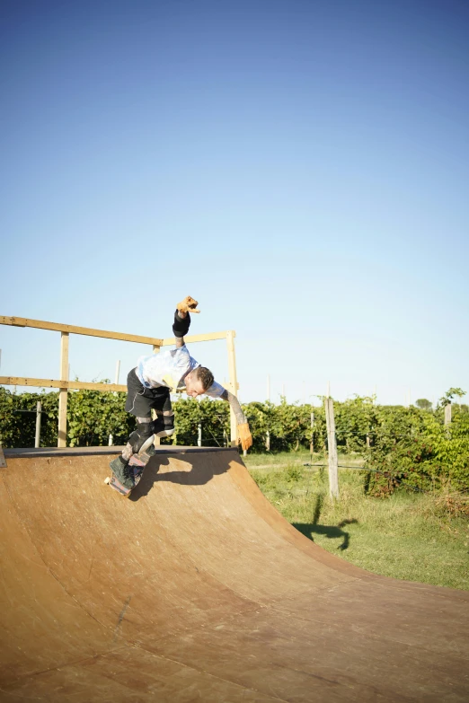 a man that is in the air on a skateboard