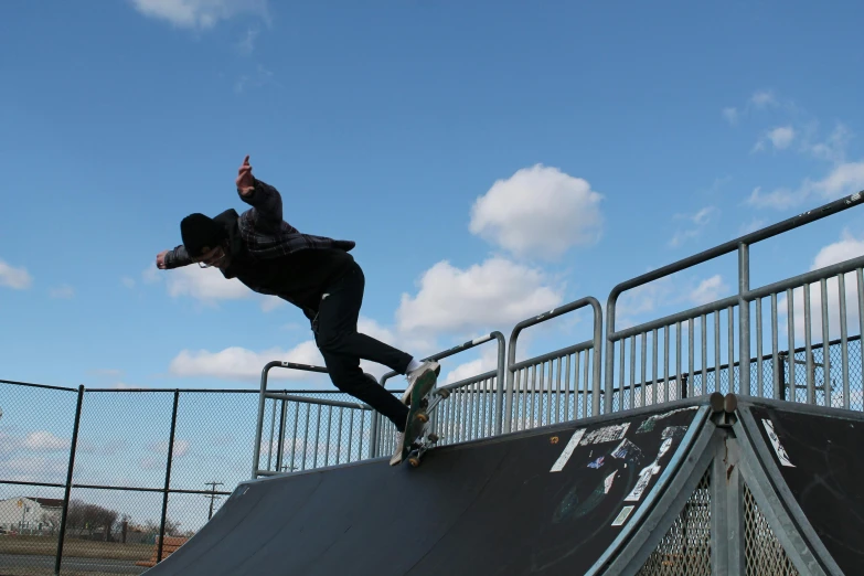 a man doing tricks on a ramp on a skateboard