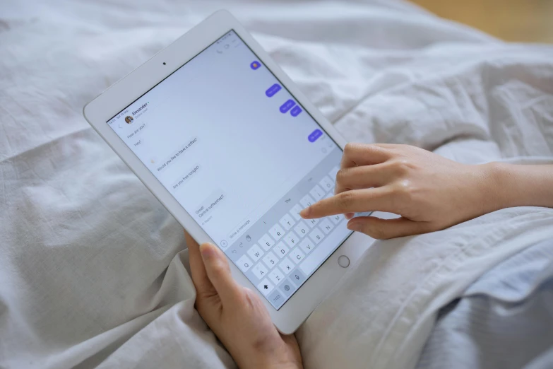 an image of the woman is using her tablet