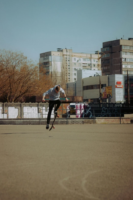 a man is riding a skateboard on the street