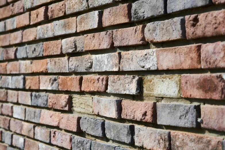 a closeup view of a brick wall with little mortar