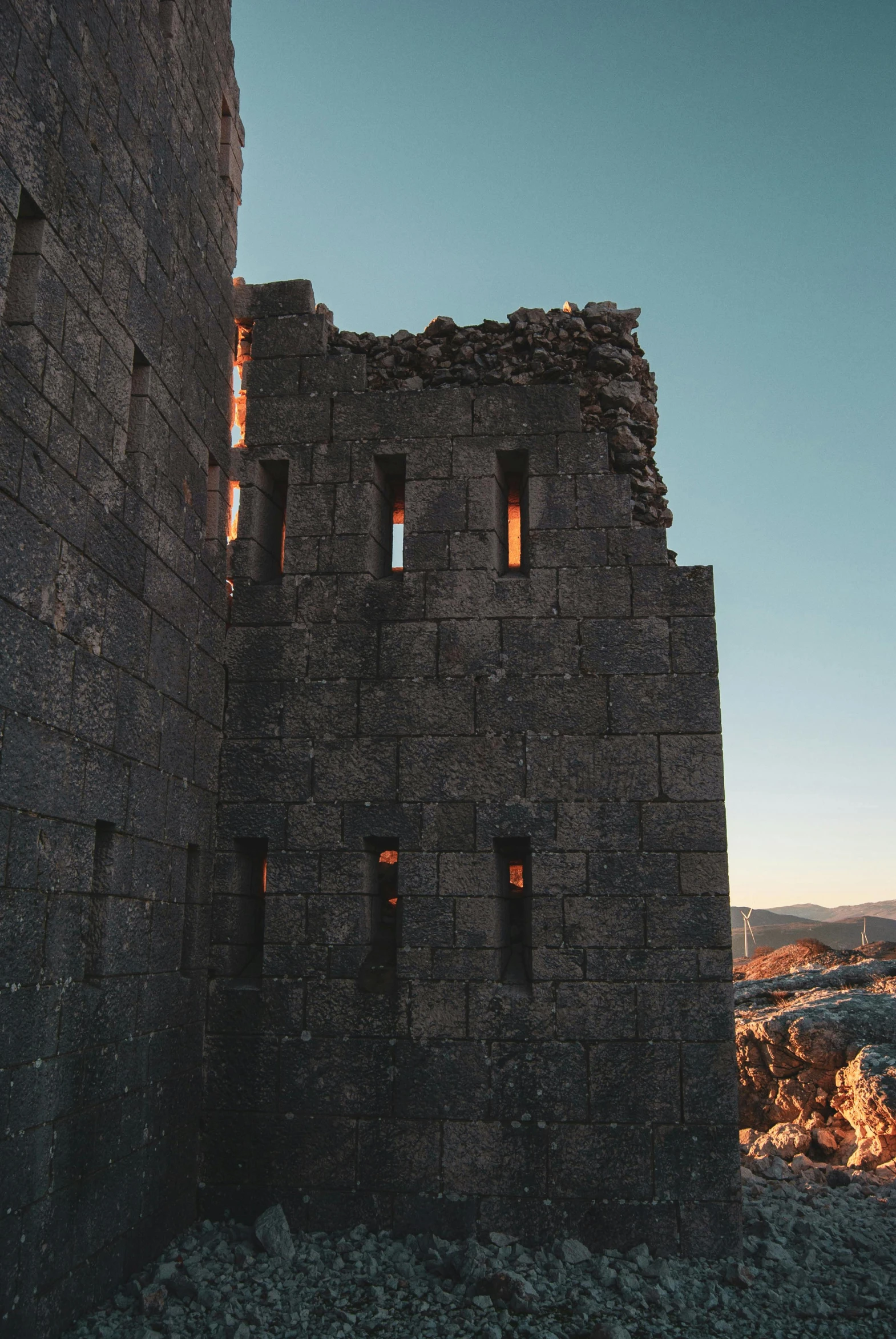 a stone castle structure that looks very dark