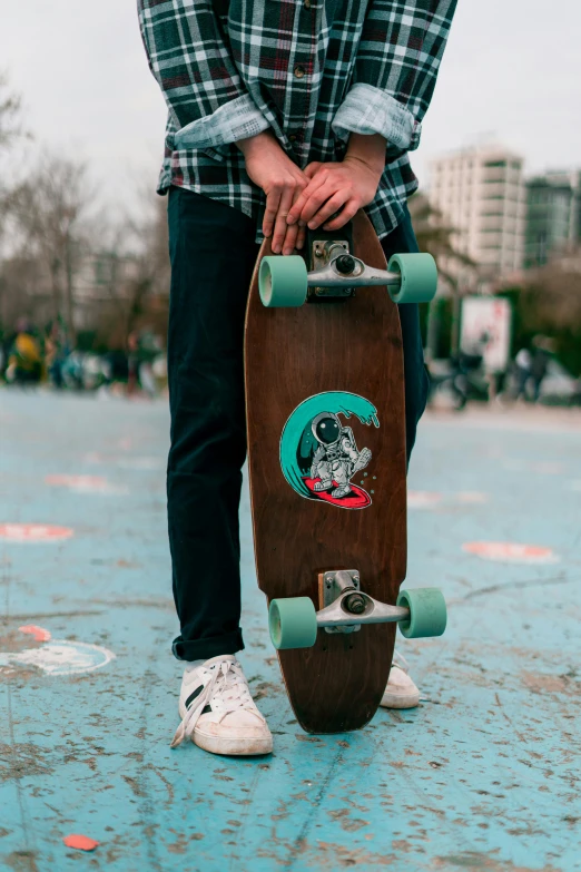 skate board with the eye of an individual standing on concrete