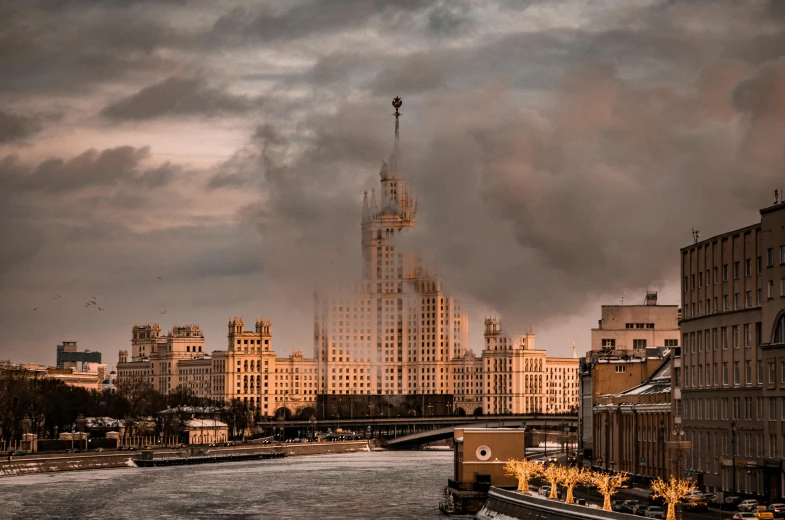 very high rise building with smoke rising out of the top