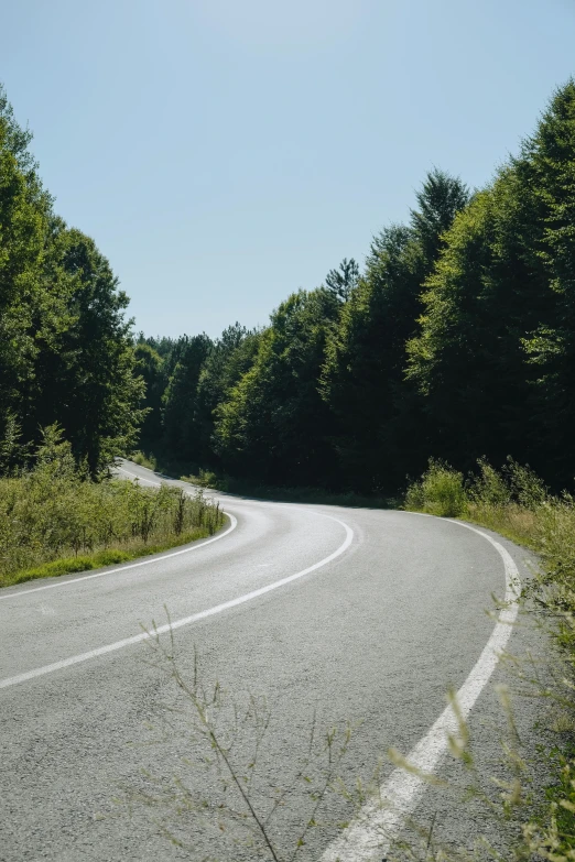 an empty road in the middle of nowhere