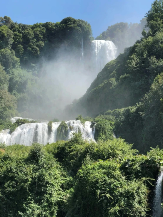 an image of water falling from a waterfall