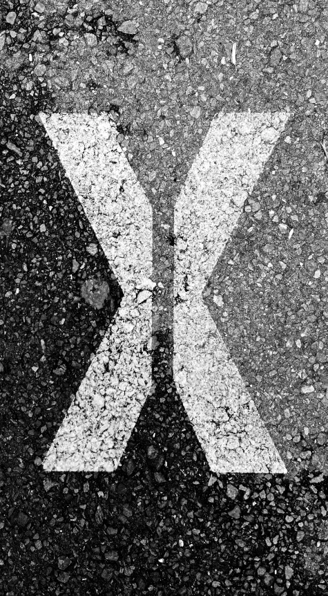 a black and white image of the letter k