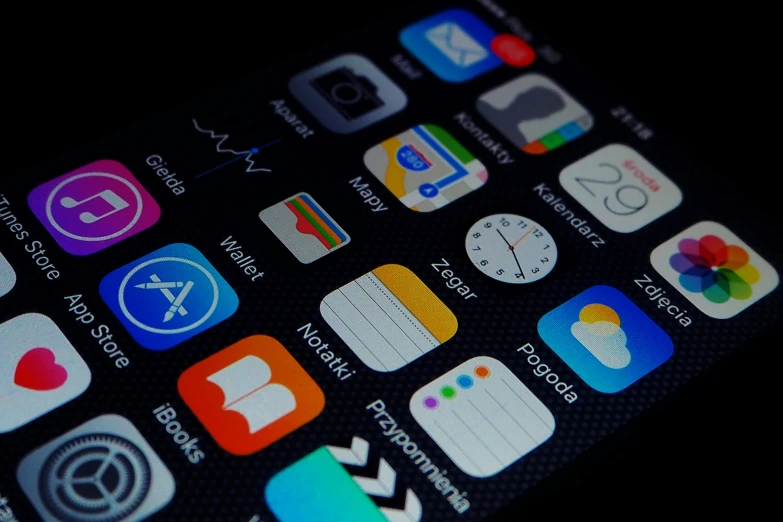 an iphone showing various application icons with focus on the app