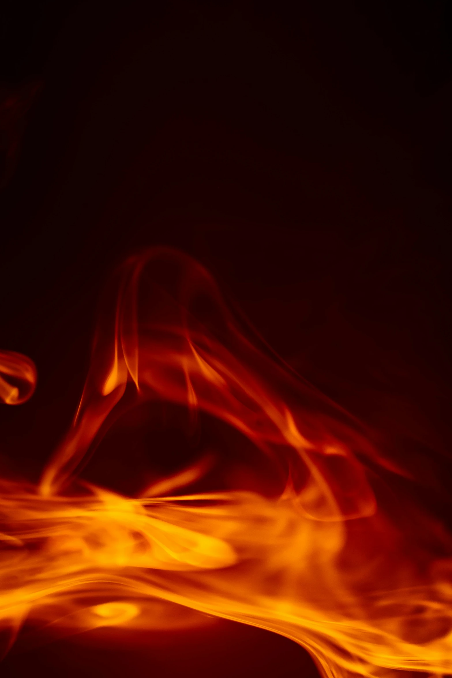 an orange and red fire background that is in motion