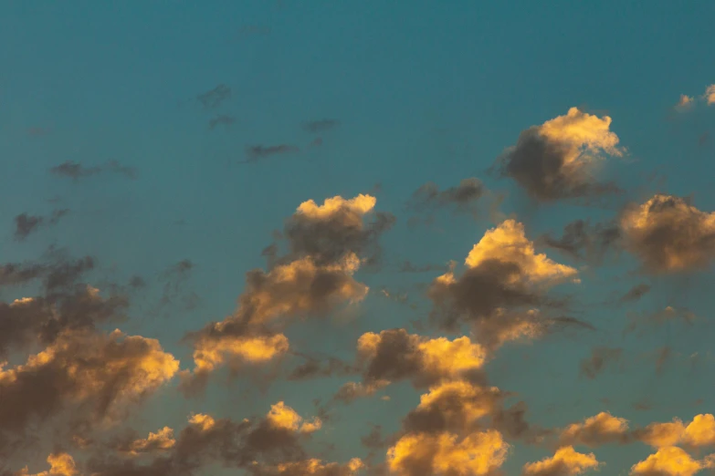 a couple of planes flying very high in the sky