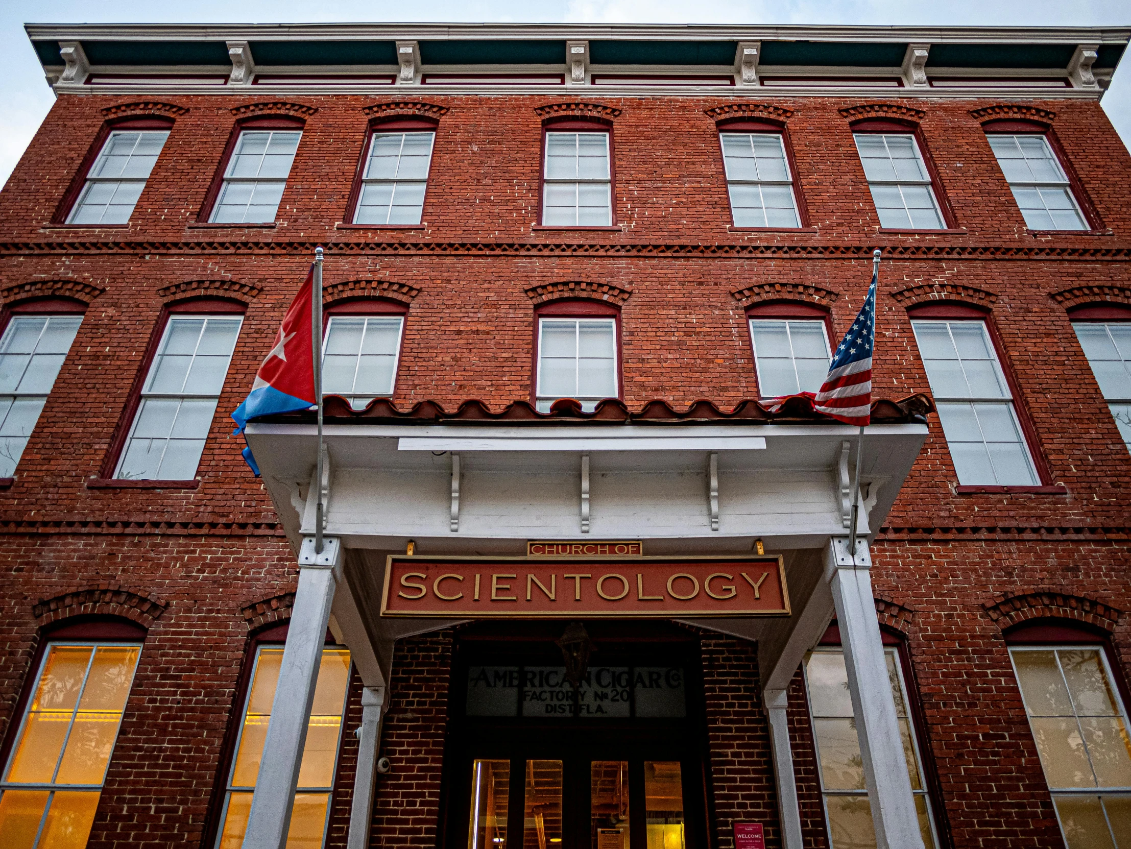 the front entrance of scientology mystery hall where visitors can take pos