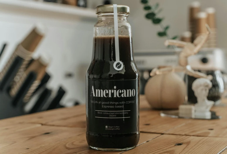 an open bottle of food on a wood table