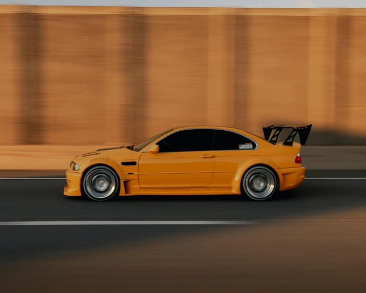 an orange car speeding down the road with no one in sight