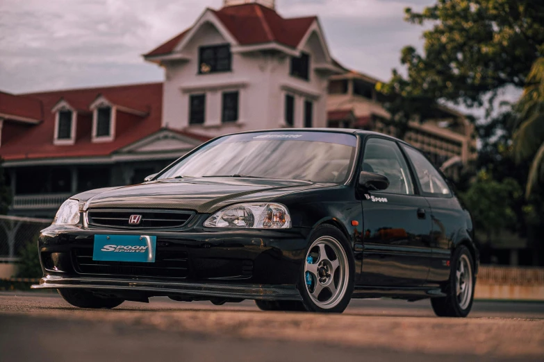 the front end of a car parked on a street