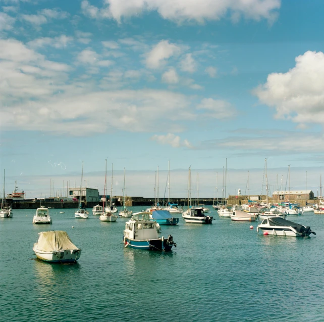 a group of boats floating in a large body of water