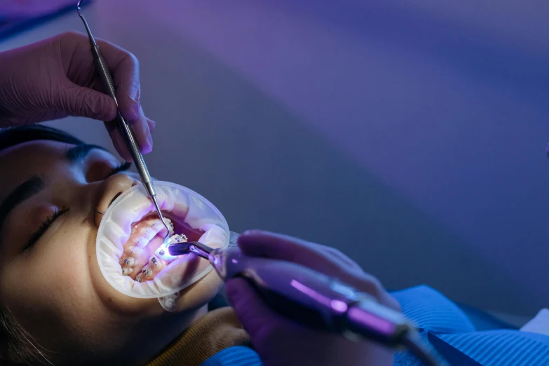 a child is being led by an electronic light