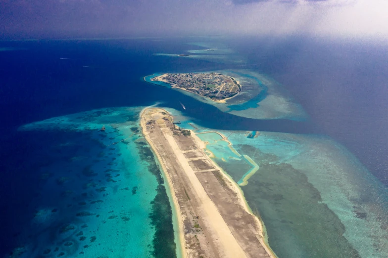 an island and airport are seen from the air