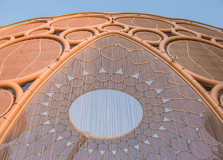 a view of the top of a building with geometric architecture