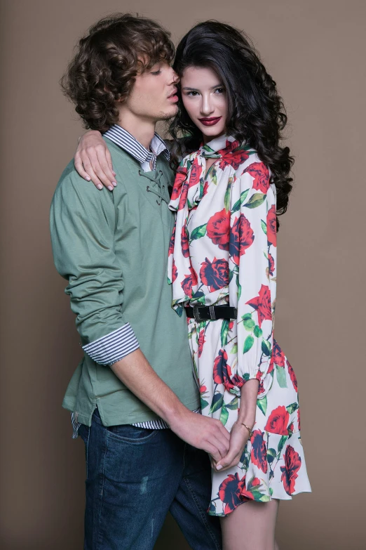 man and woman posing together for their professional picture