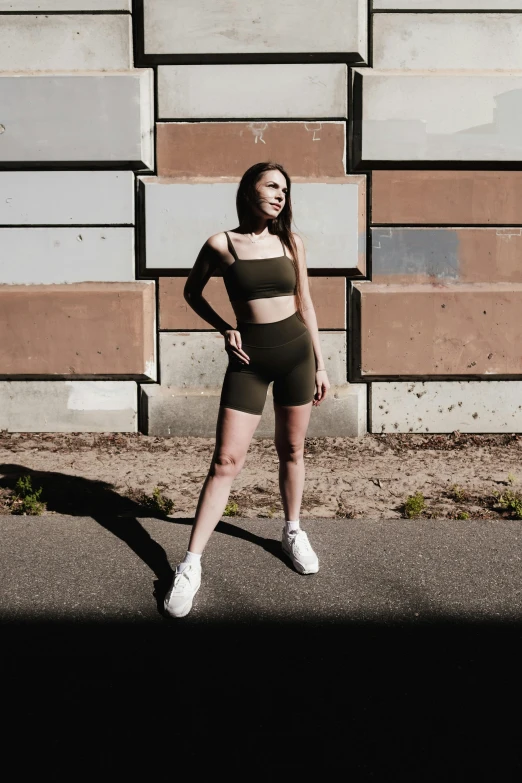 a young woman poses in a tight underwear