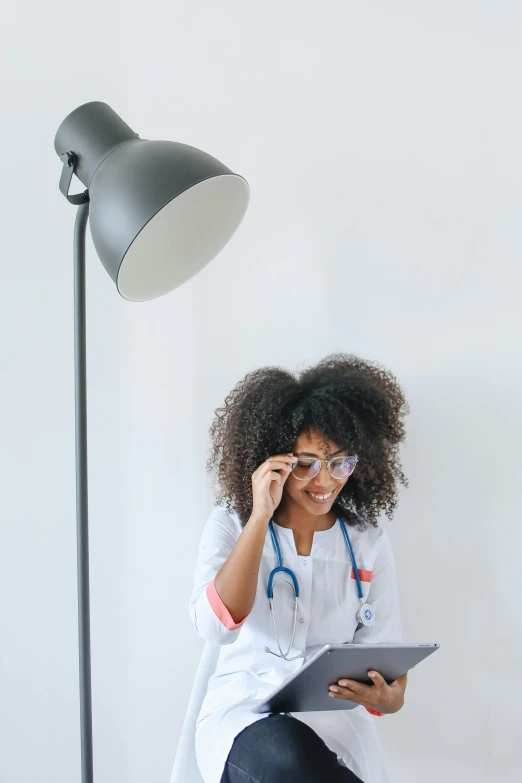 woman doctor working on a tablet