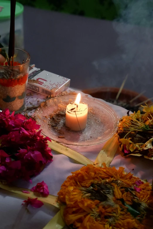 some candles and other things on a table