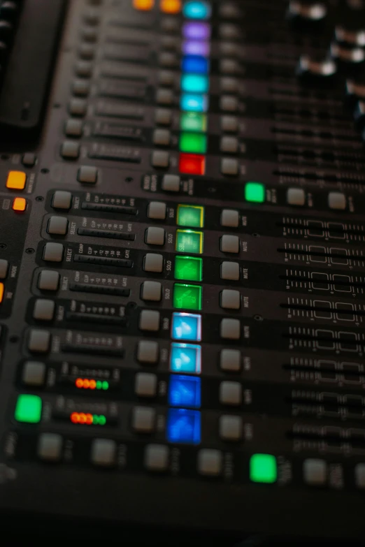 the sound board has a lot of colored ons
