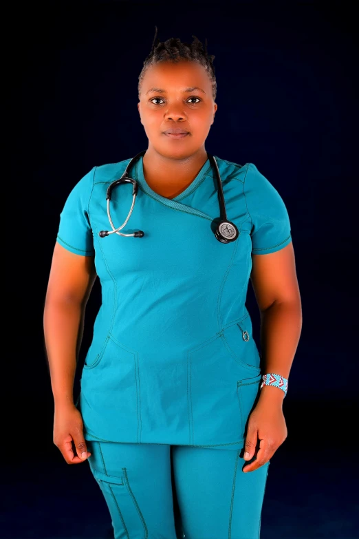 an african american female doctor wearing scrubs and a stethoscope