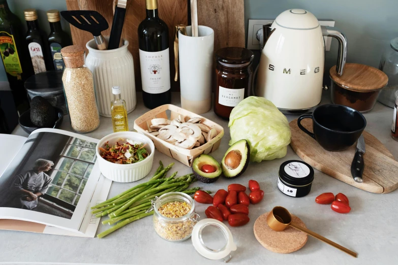 the kitchen counter is cluttered with food