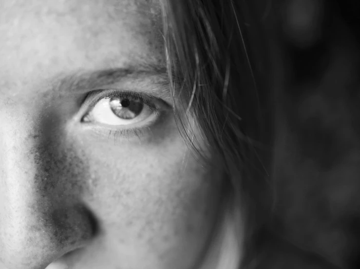 black and white pograph of a person looking forward